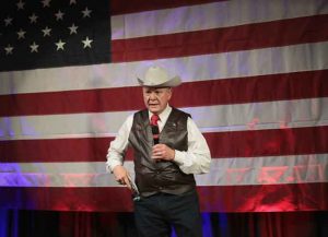 FAIRHOPE, AL - SEPTEMBER 25: Republican candidate for the U.S. Senate in Alabama, Roy Moore, displays a pistol to express his support for Second Amendment as he speaks at a campaign rally on September 25, 2017 in Fairhope, Alabama. Moore is running in a primary runoff election against incumbent Luther Strange for the seat vacated when Jeff Sessions was appointed U.S. Attorney General by President Donald Trump. The runoff election is scheduled for September 26. (Photo by Scott Olson/Getty Images)