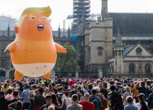 100,000 March To Protest Donald Trump In London With Baby Trump Balloon Looming Over