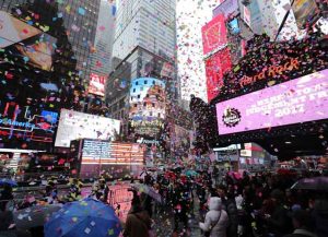 NEW YORK, NY - DECEMBER 29: Times Square Alliance and Countdown Entertainment, co-organizers of Times Square New Years Eve, along with presenting sponsor, Planet Fitness test the air worthiness of the New Years Eve confetti from the Hard Rock Cafe marquee on December 29, 2016 in New York City. (Photo by Neilson Barnard/Getty Images)
