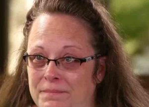 Kentucky county clerk Kim Davis ordered to pay legal fees for gay couples