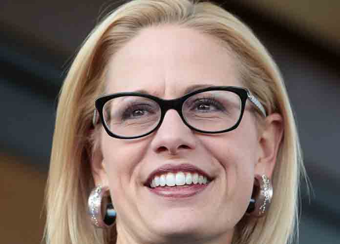 Protesters Confront Sen. Krysten Sinema Again – This Time At D.C. Airport