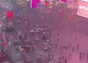 Stampede in Times Square, New York starts after motorcycle backfires