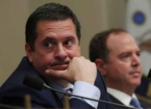 WASHINGTON, DC - JUNE 12: Ranking member Rep. Devin Nunes (R-CA) (L) and Committee Chairman Rep. Adam Schiff (D-CA) (R) listen during a hearing before the House (Select) Intelligence Committee June 12, 2019 on Capitol Hill in Washington, DC. The committee held a hearing on "Lessons from the Mueller Report: Counterintelligence Implications of Volume 1." (Image: Getty)