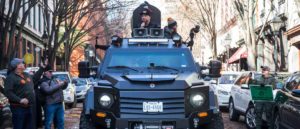 RICHMOND, VA - JANUARY 20: InfoWars host Alex Jones rides in an armored vehicle during a rally organized by The Virginia Citizens Defense League on Capitol Square near the state capitol building on January 20, 2020 in Richmond, Virginia.