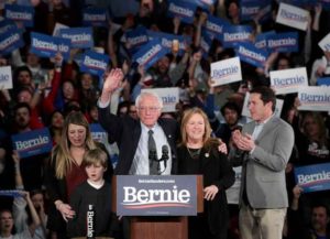 DES MOINES, IOWA - FEBRUARY 03: Democratic presidential candidate Sen. Bernie Sanders (I-VT) with his wife Jane Sanders and family addresses supporters during his caucus night watch party on February 03, 2020 in Des Moines, Iowa. Iowa is the first contest in the 2020 presidential nominating process with the candidates then moving on to New Hampshire