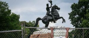 WASHINGTON, DC - JUNE 22: Protesters pull down a fence surrounding the statue of Andrew Jackson in an attempt to pull the statue down in Lafayette Square near the White House on June 22, 2020 in Washington, DC. Protests continue around the country over police brutality, racial injustice and the deaths of African Americans while in police custody.