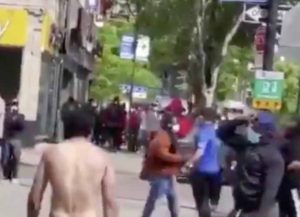 WATCH: Naked Man Starts Fighting People On New York Sidewalk During George Floyd Protests