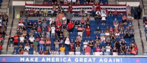TULSA, OKLAHOMA - JUNE 20: Supporters listen as U.S. President Donald Trump speaksat a campaign rally at the BOK Center, June 20, 2020 in Tulsa, Oklahoma. Trump is holding his first political rally since the start of the coronavirus pandemic at the BOK Center today while infection rates in the state of Oklahoma continue to rise.