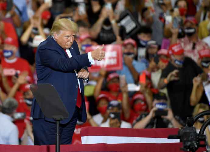 Song Linked To QAnon Conspiracy Theorists Played During Trump’s Rally Speech