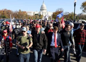 WASHINGTON, DC - NOVEMBER 14: People participate in the “Million MAGA March” from Freedom Plaza to the Supreme Court, on November 14, 2020 in Washington, DC. Supporters of U.S. President Donald Trump marching to protest the outcome of the 2020 presidential election