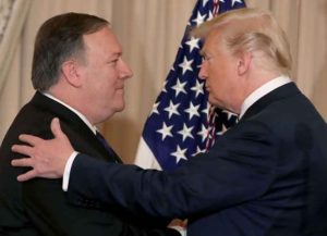 WASHINGTON, DC - MAY 02: President Donald Trump congratulates Secretary of State Mike Pompeo during a ceremonial swearing in at the State Department on May 2, 2018 in Washington, DC. Secretary Pompeo was officially sworn in on April 27th.