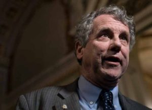 WASHINGTON, DC - JANUARY 30: Senator Sherrod Brown (D-OH) speaks to the press in the U.S. Capitol during a break on the second day that Senators have the opportunity to ask questions during impeachment proceedings against U.S. President Donald Trump on January 30, 2020 in Washington, DC.