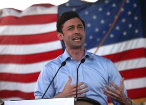 COLUMBUS, GEORGIA - OCTOBER 29: Democratic U.S. Senate candidate Jon Ossoff speaks during a "Get Out the Early Vote" drive-in campaign event on October 29, 2020 in Columbus, Georgia. With less than a week to go until Election Day, Democratic candidates for the U.S. Senate in Georgia are continuing to campaign throughout the state.