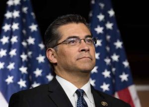 WASHINGTON, DC - MAY 11: Rep. Xavier Becerra (D-CA) listens during a news conference to discuss the rhetoric of presidential candidate Donald Trump, at the U.S. Capitol, May 11, 2016, in Washington, DC. Donald Trump is scheduled to meet with Speaker of the House Paul Ryan on Thursday near Capitol Hill.