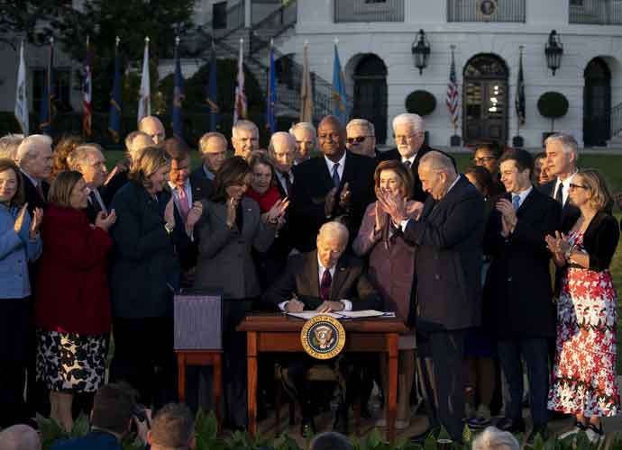 Biden Signs $1.2 Trillion Bipartisan Infrastructure Bill Into Law