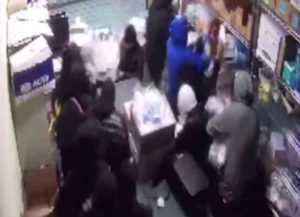 Flash mob robs store in California (Image: YouTube)