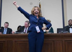 WASHINGTON, DC - NOVEMBER 30: Rep.-elect Lucy McBath (D-GA) celebrates after drawing the number 18 in the lottery draw for congressional offices November 30, 2018 in Washington, DC. As part of the new member orientation process, newly elected members of the U.S. House of Representatives take part in drawing random numbers that provide the order for selecting available congressional office space. (Photo by Win McNamee/Getty Images)