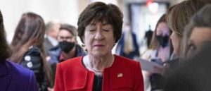 Senator Susan Collins, a Republican from Maine, pauses for a moment upon arrival to a news conference on the bipartisan modernized Violence Against Women Act (VAWA) at the U.S. Capitol in Washington, D.C., U.S., on Wednesday, Feb. 9, 2022. The legislation around the reauthorization of the VAWA includes new funding, housing protections for survivors of domestic abuse and closing loopholes in previously passed firearm legislation. Photographer: Sarah Silbiger/Bloomberg via Getty Images