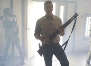 Missouri GOP Senate candidate Eric Greitens poses with assault weapon hunting for RINOs in new ad (Image: YouTube)