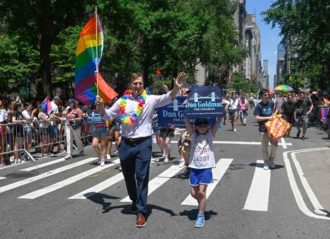 NEW YORK, NEW YORK - JUNE 26: Congressional candidate Dan Goldman marches with his daughter in the 2022 New York City Pride march on June 26, 2022 in New York City. (Photo by Astrida Valigorsky/Getty Images)