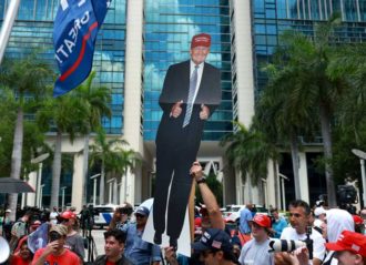 MIAMI, FLORIDA - JUNE 13: Supporter Joe Compono holds a cutout of former President Donald Trump outside the Wilkie D. Ferguson Jr. United States Federal Courthouse where Trump is scheduled to be arraigned later in the day on June 13, 2023 in Miami, Florida. Trump is scheduled to appear in the federal court for his arraignment on charges including possession of national security documents after leaving office, obstruction, and making false statements. (Photo by Joe Raedle/Getty Images)
