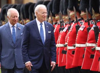 WINDSOR, ENGLAND - JULY 10: King Charles III and US President Joe Biden review a guard of honour at Windsor Castle on July 10, 2023 in Windsor, England. The President is visiting the UK to further strengthen the close relationship between the two nations and to discuss climate issues with King Charles III. (Photo by Ian Vogler - WPA Pool/Getty Images)