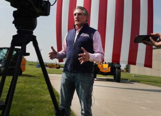 ELKHART, IOWA - JUNE 09: Republican presidential candidate North Dakota Governor Doug Burgum speaks to reporters following a town hall meeting with employees at Rueter's equipment dealership on June 09, 2023 in Elkhart, Iowa. Burgum is making his first campaign swing through Iowa since announcing his candidacy earlier this week. (Photo by Scott Olson/Getty Images)