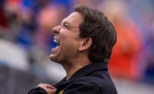 JACKSONVILLE, FLORIDA - OCTOBER 29: Florida Governor Ron DeSantis looks on before the start of a game between the Georgia Bulldogs and the Florida Gators at TIAA Bank Field on October 29, 2022 in Jacksonville, Florida. (Photo by James Gilbert/Getty Images)