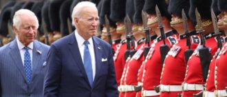 WINDSOR, ENGLAND - JULY 10: King Charles III and US President Joe Biden review a guard of honour at Windsor Castle on July 10, 2023 in Windsor, England. The President is visiting the UK to further strengthen the close relationship between the two nations and to discuss climate issues with King Charles III. (Photo by Ian Vogler - WPA Pool/Getty Images)