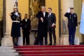 VIDEO: Trump & French President Macron Share Awkward, 25-Second Handshake In Paris