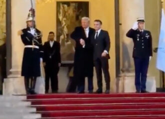 VIDEO: Trump & French President Macron Share Awkward, 25-Second Handshake In Paris