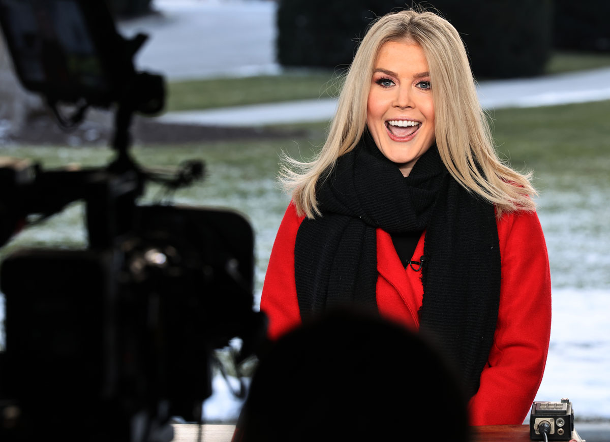 WASHINGTON, DC - JANUARY 21: President Donald Trump's new Press Secretary Karoline Leavitt (C) talks with reporters after talking to FOX News on her first full day of work at the White House on January 21, 2025 in Washington, DC. Tuesday marks the first full day of Trump's second term in the White House. (Photo by Chip Somodevilla/Getty Images)