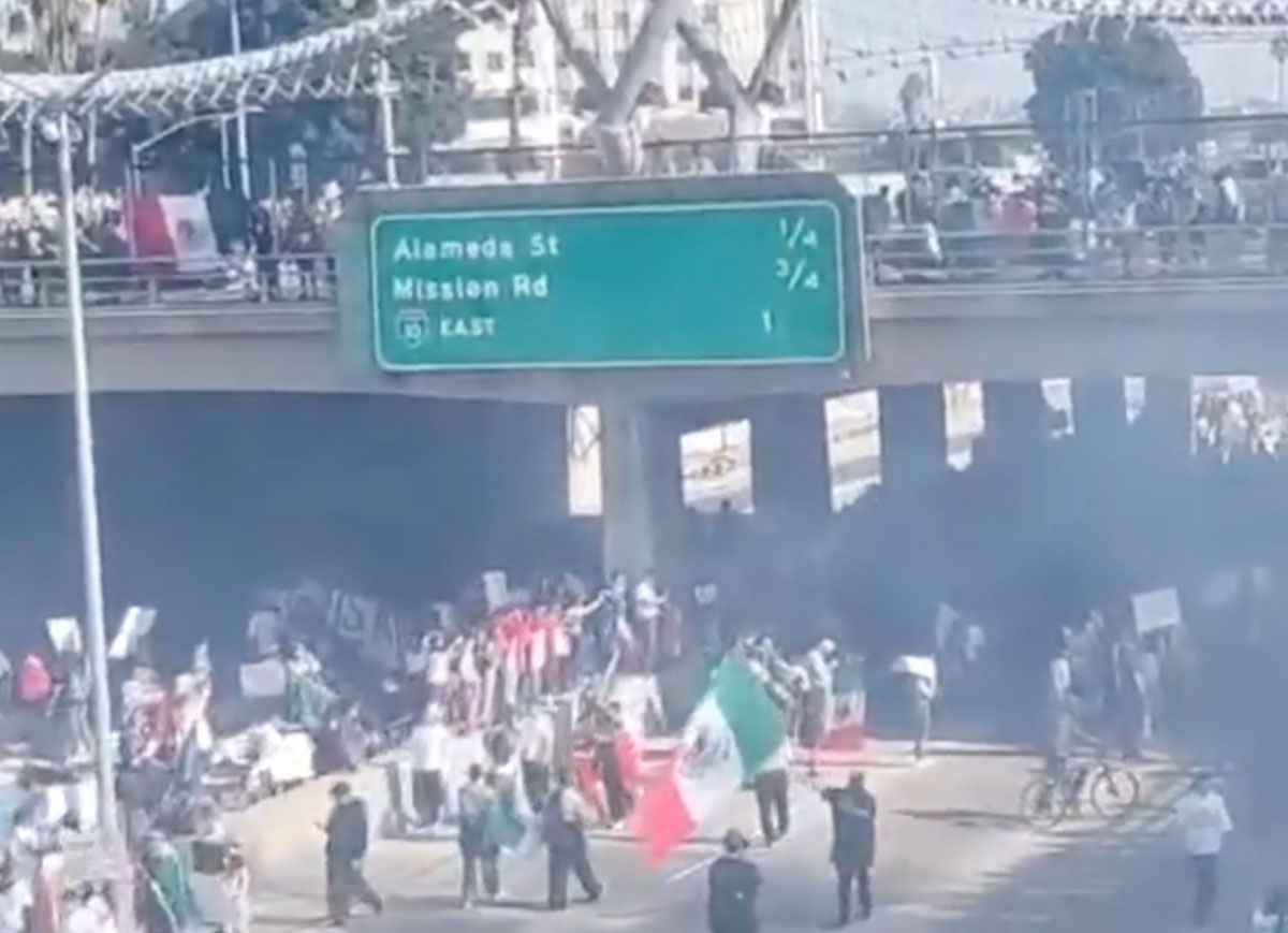 VIDEO: Protesters Block L.A. Freeway In Response To Trump Administration’s Immigration Crackdown Waving Mexican Flags