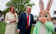 WASHINGTON, DC - APRIL 21: U.S. President Donald Trump, first lady Melania Trump and the Easter Bunny greet guests durning the White House Egg Roll on the South Lawn of the White House on April 21, 2025 in Washington, DC. The White House is expecting thousands of children and adults to participate in the annual tradition of rolling colored eggs down the White House lawn, which was started by President Rutherford B. Hayes in 1878. (Photo by Anna Moneymaker/Getty Images)