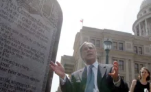AUSTIN, TX - JUNE 27: Texas Attorney General Greg Abbott attends a press conference celebrating the U.S. Supreme Court decision that allows a Ten Commandments monument to stand outside the Texas State Capitol June 27, 2005 in Austin, Texas. A sharply divided Supreme Court upheld the constitutionality of displaying the Ten Commandments on government land, but drew the line on displays inside courthouses, saying they violated the doctrine of separation of church and state. (Photo by Jana Birchum/Getty Images)